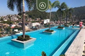 1BR Condo with Rooftop Pool - Romantic Zone